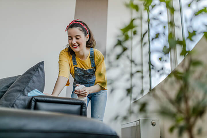 Cleaning Your Couch: using towel to clean